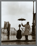 Musician in the Rain Framed Canvas Print by Robert Doisneau Musician in the Rain Framed Canvas Print by Robert Doisneau