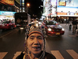An Aka Hill Tribe Woman Smiles as She Waits to Sell Souvenirs Photographic Print by David Longstreath