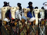 A Wodabe Man Waits to Perform a Dance of Male Beauty at a Festival in Ingall, Niger, Sept. 25, 2003 Photographic Print by Christine Nesbitt