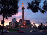 Traffic Passes by the Angel of Independence Monument in the Heart of Mexico City Photographic Print by John Moore
