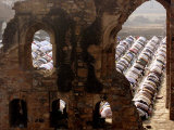 Muslims Offer Eid Prayers at the Ruins of Jami Mosque, Which was Built in 1345 AD Fotografie-Druck von Manish Swarup