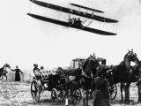 Wilbur Wright with His Plane in Flight at Pau in France, February 1909 Photographie