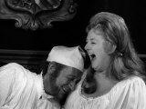 Joan Sims with Sid James in a Scene from the Carry on Film Carry on Henry, October 1970 Photographie