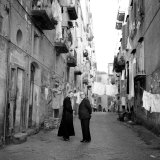 A Priest Chats to an Elderly Man in a Street, Naples, Italy 1957 Photographic Print