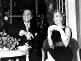 Marilyn Monroe Drinking a Cup of Tea as She Sits with Laurence Olivier Smoking a Cigarette, 1956 Photographic Print