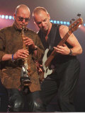 Sting Rock Singer in Aberdeen with Guitar Beside His Saxaphone Player Photographic Print