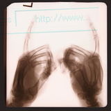 X-Ray of Hands Typing Web Address on Computer Lámina fotográfica