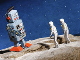 Astronaut Figurines Standing Beside Gray Toy Rocket Photographic Print