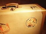 Brown Antique Suitcase Covered in Travel Stickers Lámina fotográfica