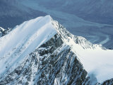 Icy Summit of Snow Covered Mountain Lámina fotográfica