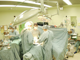 Surgeons Performing Operation Photographic Print