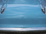 Chrome Decorations on Front of Blue Car Photographie