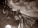 The Crew of a Yarmouth Herring Boat Pull in Their Catch on a Storm Tossed North Sea, 1935 Photographic Print
