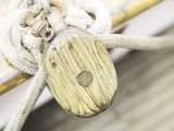 Wooden Pulley and Rope on Edge of Boat Fotografická reprodukce