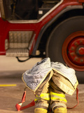 Firefighting Gear with Truck in Background Fotografie-Druck