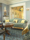 Living Room Chair with Table and Blue Rug Photographic Print