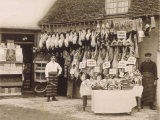 Fine Display of Meat Displayed Outside a Butcher's Shop Lámina fotográfica Fine Display of Meat Displayed Outside a Butcher's Shop Lámina fotográfica