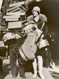 Woman Has Been Very Busy Shopping So Much So That Her Helper is Hidden Under a Pile of Parcels Fotografická reprodukce