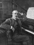 Giacomo Puccini Leans on the Pianoa Cigarette Dangling from the Side of His Mouth Photographic Print by G. Magrini