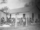 Prison Compound No. 1, Angola, Louisiana, Leadbelly in Foregound Affiche par Alan Lomax