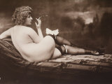 Portrait of a Young Woman Posing Naked, with Her Back Turned, as She Smokes a Cigarette Photographie