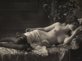 A Barebreasted Young Woman Lying Down, Wearing Shoes and Lingerie Photographie