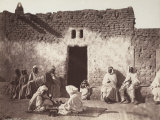 Group of People in Front of a Cafe of Biskra Photographic Print