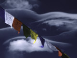 Prayer Flags Infront of Clouds, Nepal Print by Michael Brown