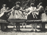 Traditional Dance Scene with Ladies Wearing Hungarian Traditional Dresses Photographie