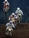 Four Racing Motorcycles Photographie