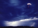 Parachuting in an Electrical Storm Photographic Print