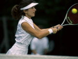 Tennis Player Hitting the Ball Photographic Print