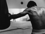 Monochromatic Image of a Boxer Working Out Photographic Print