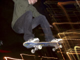 Skateboarder in Midair at Night Photographic Print
