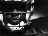 Close-up of An American Football Player Wearing a Helmet Photographie