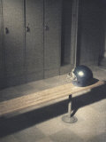 Football Helmet on Bench in Locker Room Photographic Print
