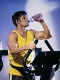 Young Man Drinking Water During Exercise Photographic Print