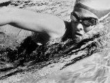 Woman Swimming in a Swimming Pool Photographic Print