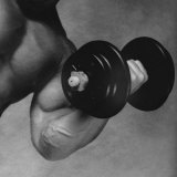 Close-up of a Man Lifting a Dumbbell Photographic Print
