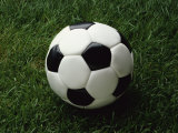 Soccer Ball in Grass Photographic Print