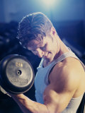 Young Man Exercising with Dumbbells Photographic Print