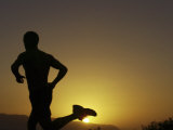 Silhouette of a Man Running Impressão fotográfica
