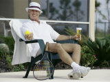 Man Relaxing with a Beer After His Tennis Match Photographic Print
