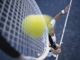 High Angle View of a Mid Adult Man Playing Tennis Photographic Print