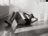Woman Doing Crunches Photographic Print