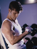 Young Man Exercising with Dumbbells Photographic Print
