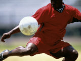 Soccer Player Preparing to Kick Ball Photographic Print