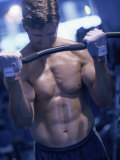 Young Man Exercising with Barbells Photographic Print