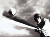 Low Angle View of a Baseball Player Swinging a Baseball Bat Photographie