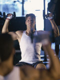Young Man Exercising with Dumbbells Photographic Print